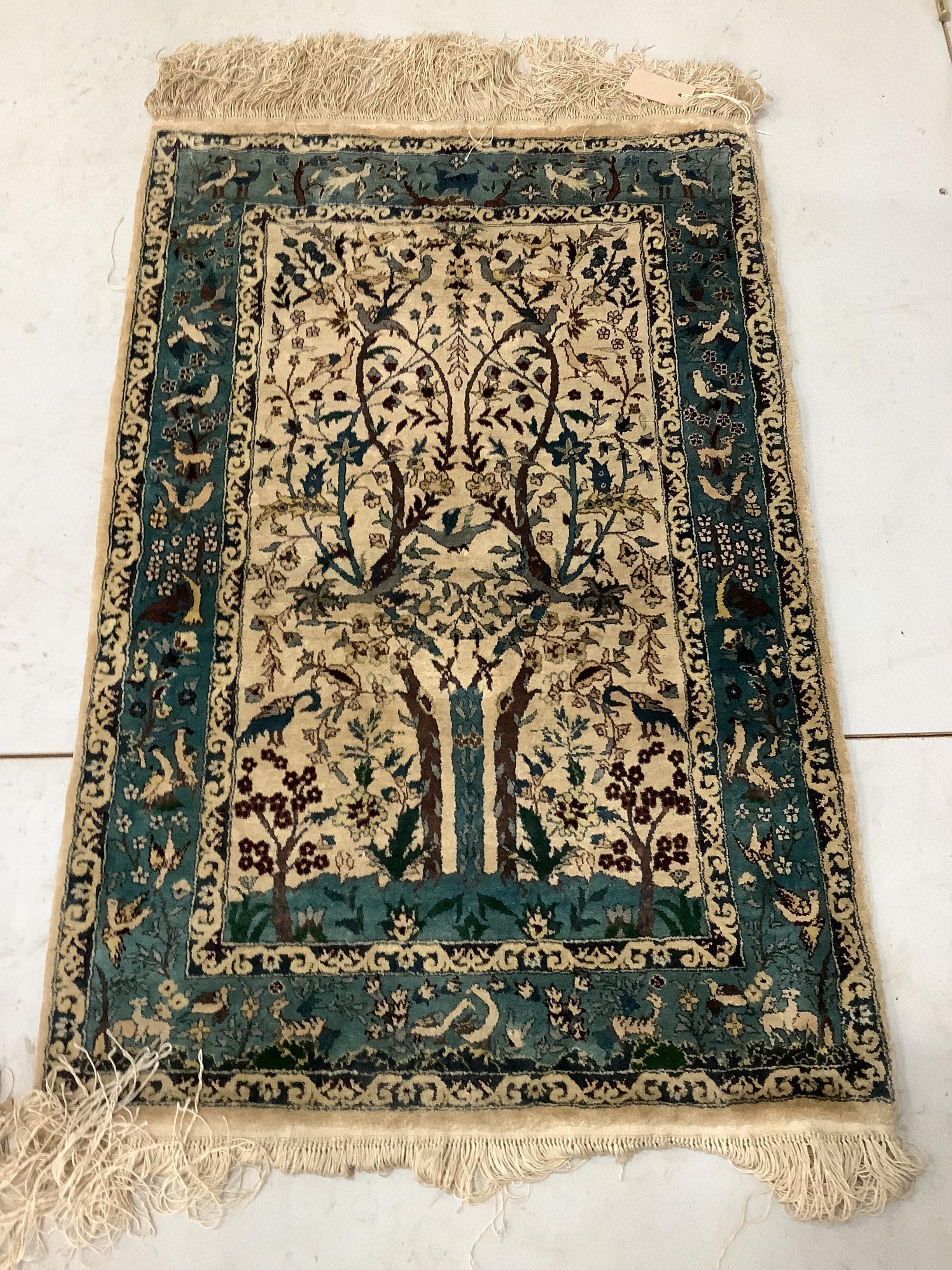 A small part silk mat, 96 x 62cm